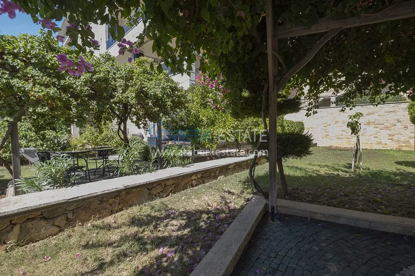 Приобрести Меблированный садовый дуплекс с двумя спальнями, застекленным балконом и видом на море в Алании 14 