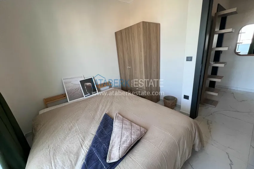 Приобрести Двухуровневый пентхаус «под ключ» с открытым видом на море и горы – новостройки Алании, район Махмутлар 16 