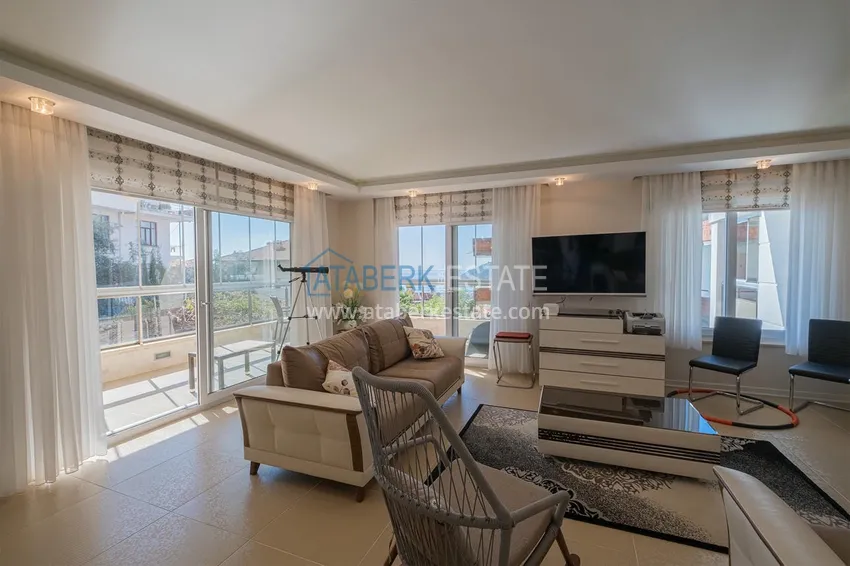 Приобрести Меблированный садовый дуплекс с двумя спальнями, застекленным балконом и видом на море в Алании 17 