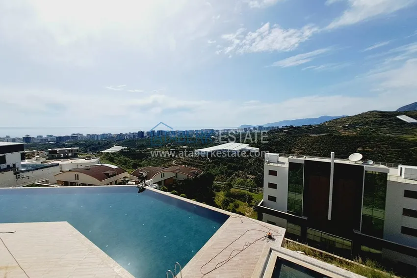 Приобрести Видовой пентхаус-дуплекс в элитном жилом комплексе – Алания, район Махмутлар 18 