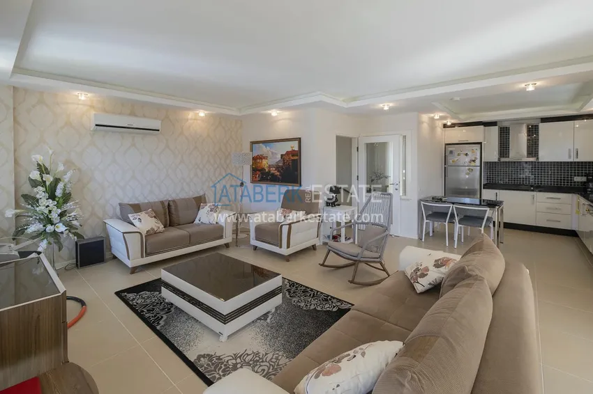 Приобрести Меблированный садовый дуплекс с двумя спальнями, застекленным балконом и видом на море в Алании 18 