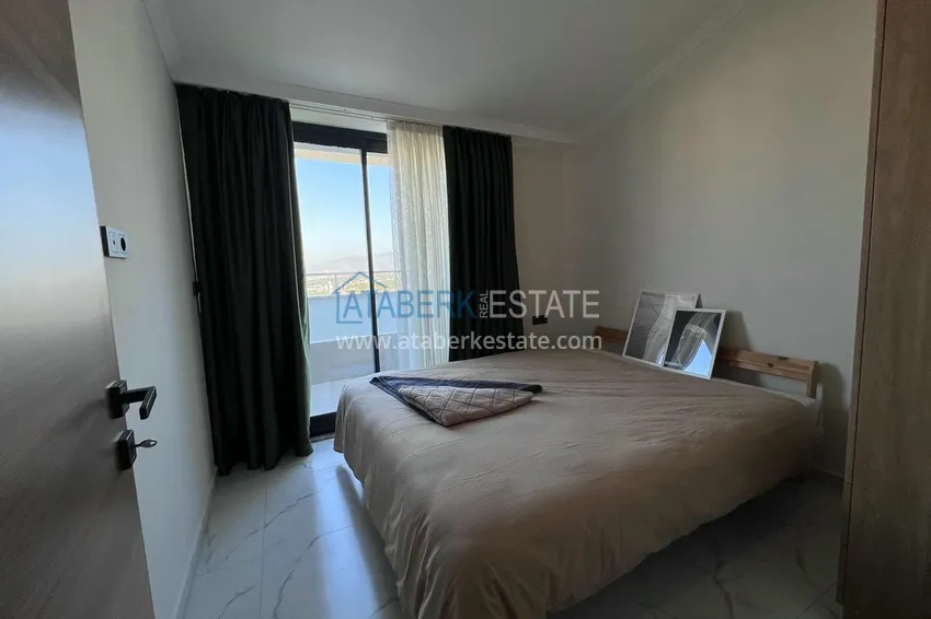 Приобрести Двухуровневый пентхаус «под ключ» с открытым видом на море и горы – новостройки Алании, район Махмутлар 19 