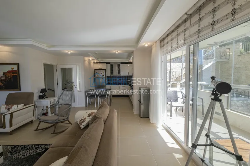 Приобрести Меблированный садовый дуплекс с двумя спальнями, застекленным балконом и видом на море в Алании 19 