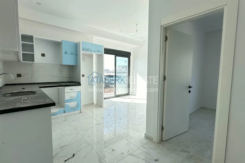 Приобрести Двухкомнатная квартира с видом на море и горы в новостройке – Алания, район Махмутлар 1