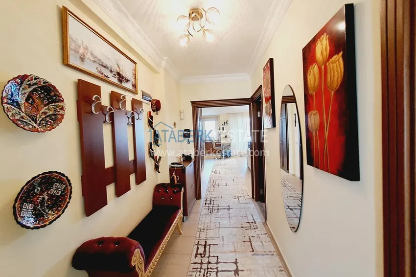 Приобрести Недвижимость под ВНЖ. Квартира от собственника с мебелью, застекленными балконами и видом на горы в Алании, район Тосмур 1 