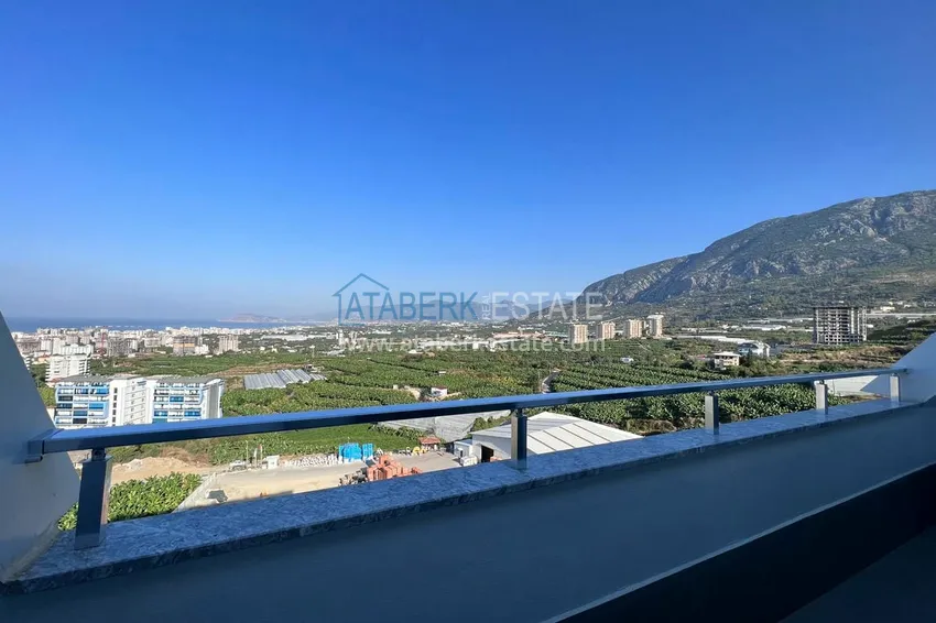 Приобрести Двухуровневый пентхаус «под ключ» с открытым видом на море и горы – новостройки Алании, район Махмутлар 22 