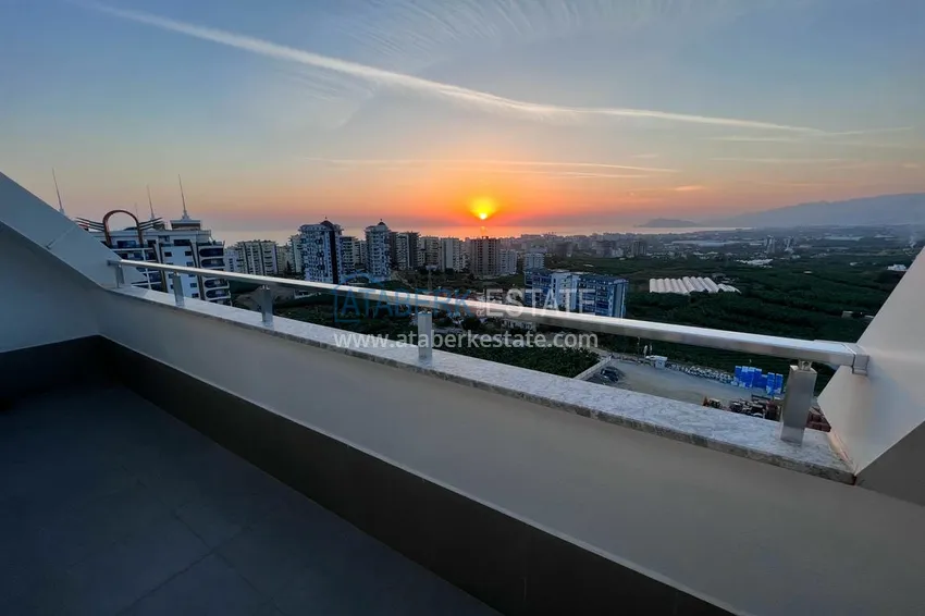 Приобрести Двухуровневый пентхаус «под ключ» с открытым видом на море и горы – новостройки Алании, район Махмутлар 23 