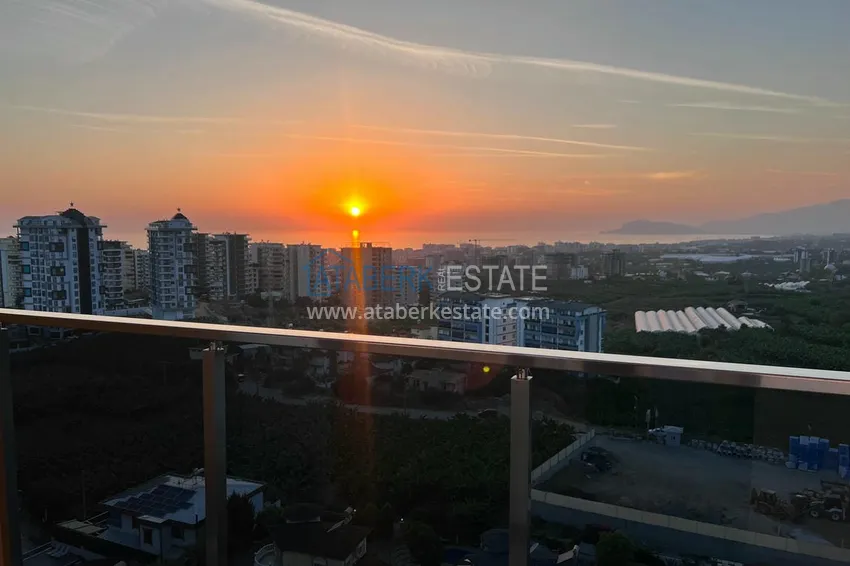 Приобрести Двухуровневый пентхаус «под ключ» с открытым видом на море и горы – новостройки Алании, район Махмутлар 24 