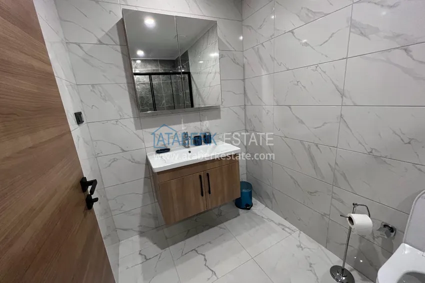 Приобрести Двухуровневый пентхаус «под ключ» с открытым видом на море и горы – новостройки Алании, район Махмутлар 26 