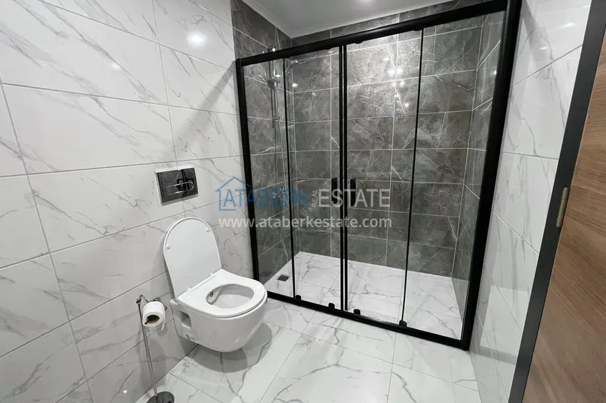 Приобрести Двухуровневый пентхаус «под ключ» с открытым видом на море и горы – новостройки Алании, район Махмутлар 27 