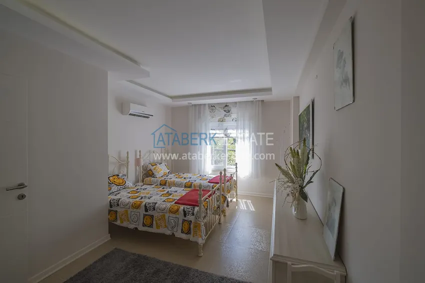 Приобрести Меблированный садовый дуплекс с двумя спальнями, застекленным балконом и видом на море в Алании 36 