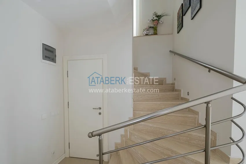 Приобрести Меблированный садовый дуплекс с двумя спальнями, застекленным балконом и видом на море в Алании 41 