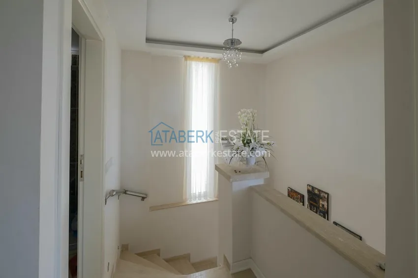 Приобрести Меблированный садовый дуплекс с двумя спальнями, застекленным балконом и видом на море в Алании 44 