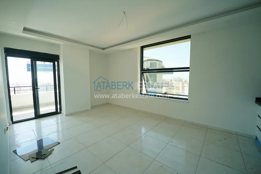 Приобрести Квартиры и пентхаусы с чистовой отделкой различных планировок в районе Махмутлар – Новостройка  12 