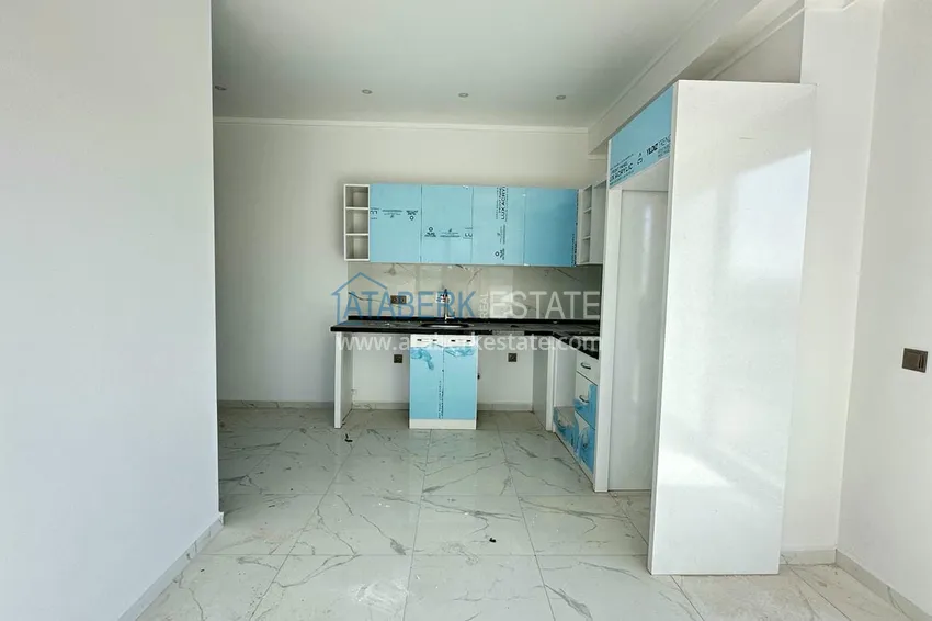 Приобрести Двухкомнатная квартира с видом на море и горы в новостройке – Алания, район Махмутлар 4