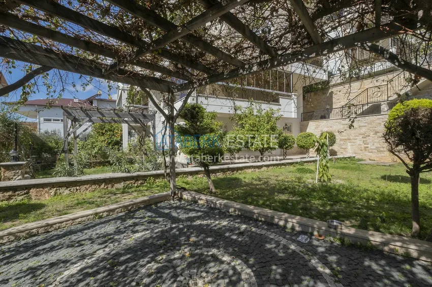 Меблированный садовый дуплекс с двумя спальнями, застекленным балконом и видом на море в Алании 6 