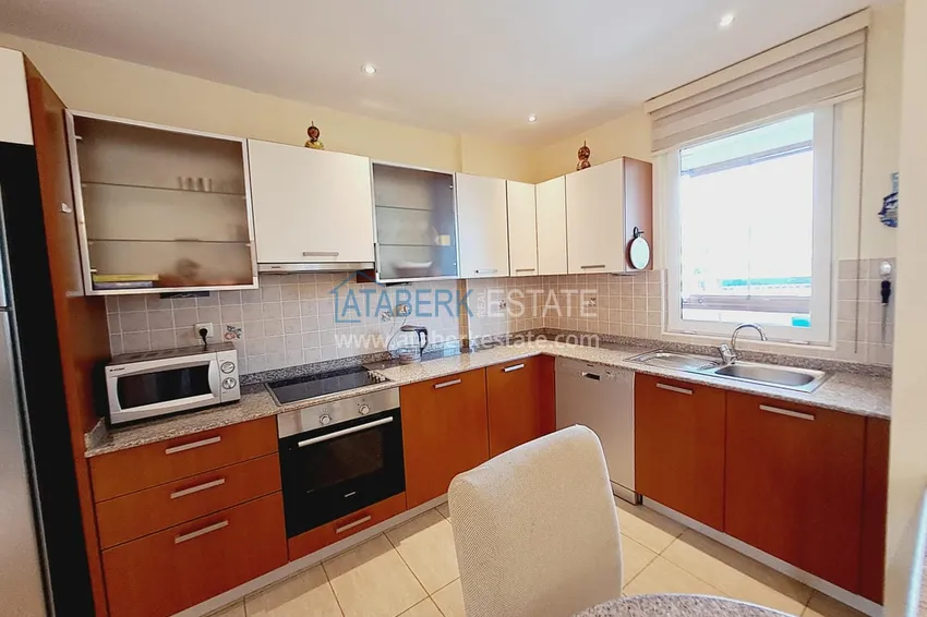 Приобрести Недвижимость под ВНЖ. Квартира от собственника с мебелью, застекленными балконами и видом на горы в Алании, район Тосмур 6 