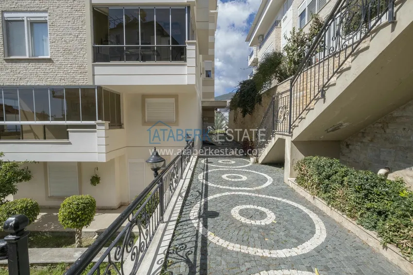 Меблированный садовый дуплекс с двумя спальнями, застекленным балконом и видом на море в Алании 7 