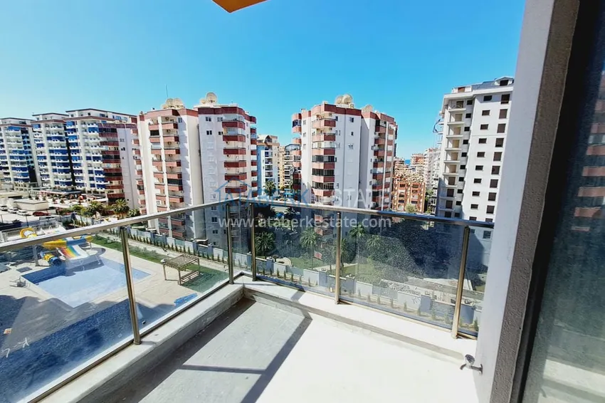 Приобрести Двухкомнатная квартира в Махмутларе от собственника с чистовой отделкой – новостройки Алании 7 