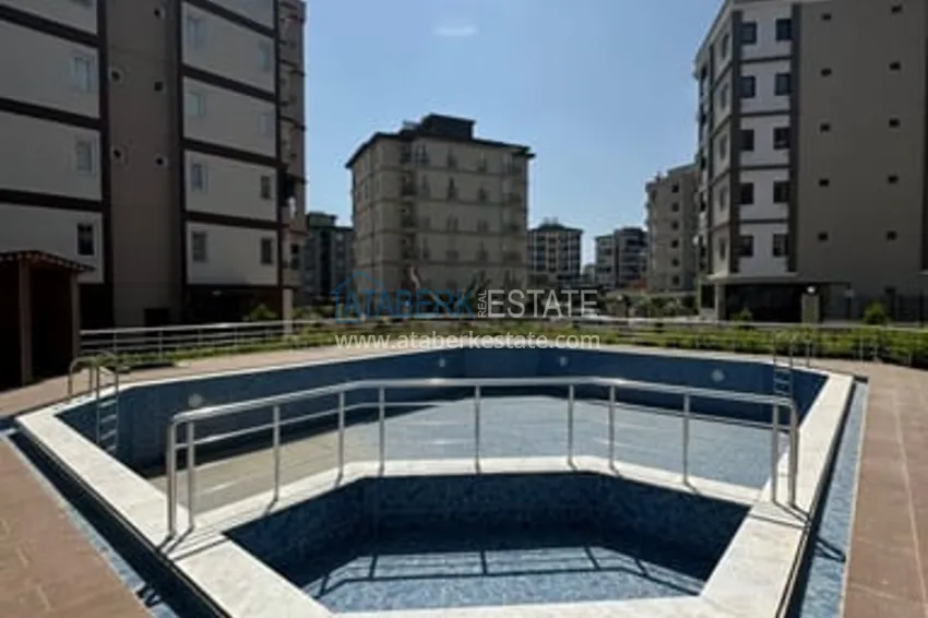 Трехкомнатная квартира с чистовой отделкой и террасой район Мезитли-Мерсин 3 