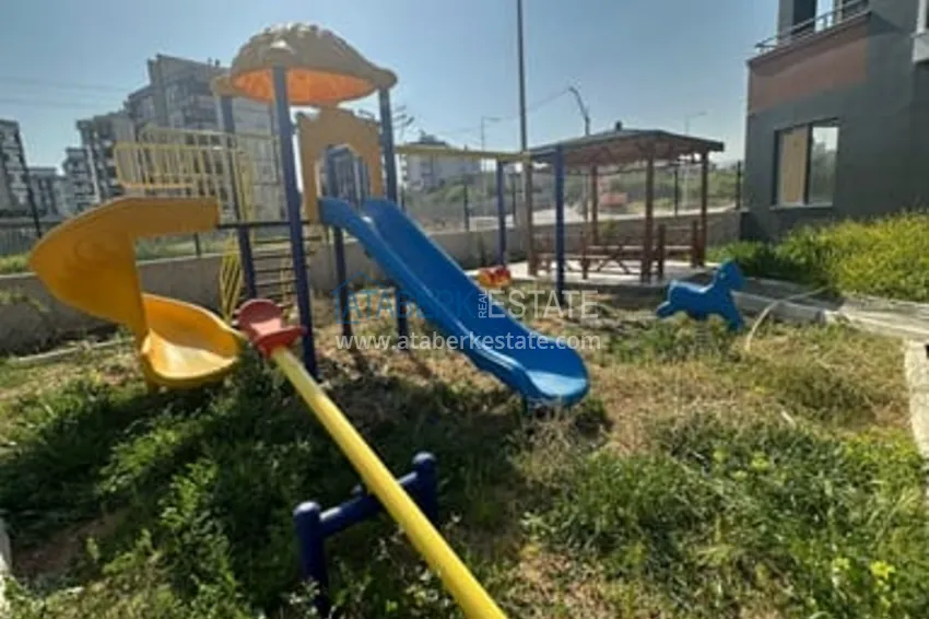 Квартира 2+1 с чистовой отделкой в малоэтажном жилом комплексе Мезитли-Мерсин 4 