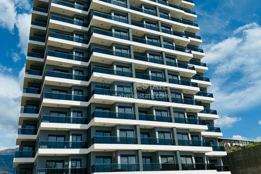 Двухкомнатная квартира от инвестора в строящемся жилом комплексе - Махмутлар 4 