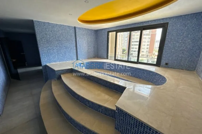 Квартира 2+1 в жилом комплексе с инфраструктурой отельного типа район Соли-Мерсин 17 