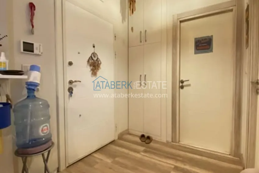 Приобрести Меблированная двухкомнатная квартира в районе Енишехир-Мерсин 11 