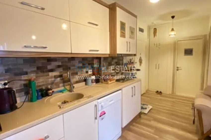 Приобрести Меблированная двухкомнатная квартира в районе Енишехир-Мерсин 7 