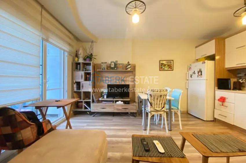 Приобрести Меблированная двухкомнатная квартира в районе Енишехир-Мерсин 2 