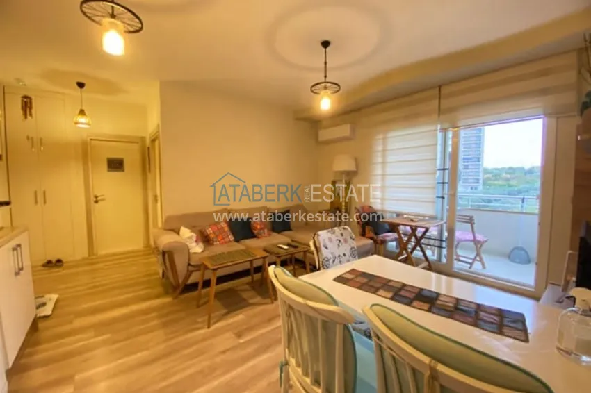 Приобрести Меблированная двухкомнатная квартира в районе Енишехир-Мерсин 3 