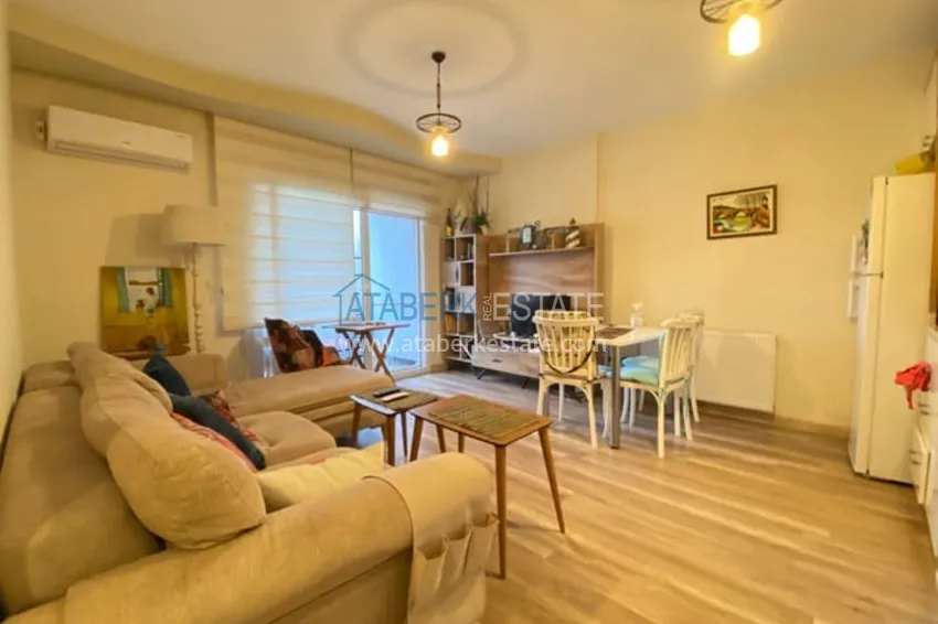 Приобрести Меблированная двухкомнатная квартира в районе Енишехир-Мерсин 4 