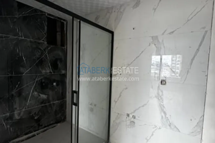 Приобрести Квартира 3+1 с видом на море на завершающем этапе строительства район Томюк-Мерсин 21 