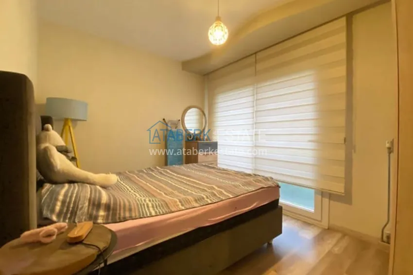 Приобрести Меблированная двухкомнатная квартира в районе Енишехир-Мерсин 9 