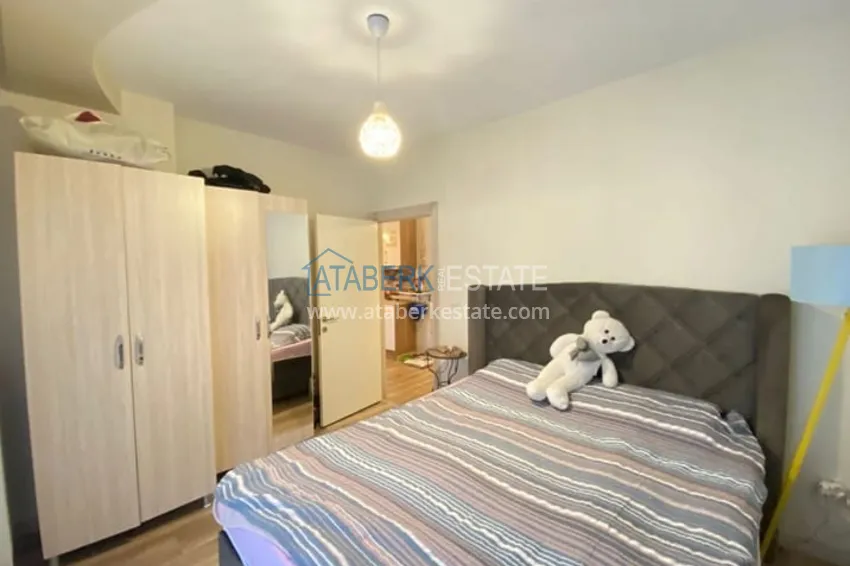 Приобрести Меблированная двухкомнатная квартира в районе Енишехир-Мерсин 10 