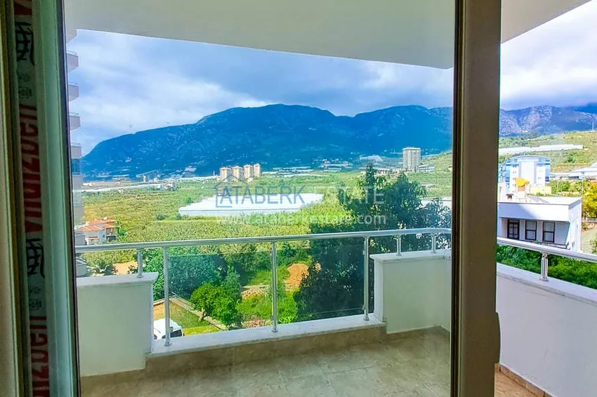 Приобрести Просторная трехкомнатная квартира с видом на море и горы в районе Махмутлар, Алания  10 