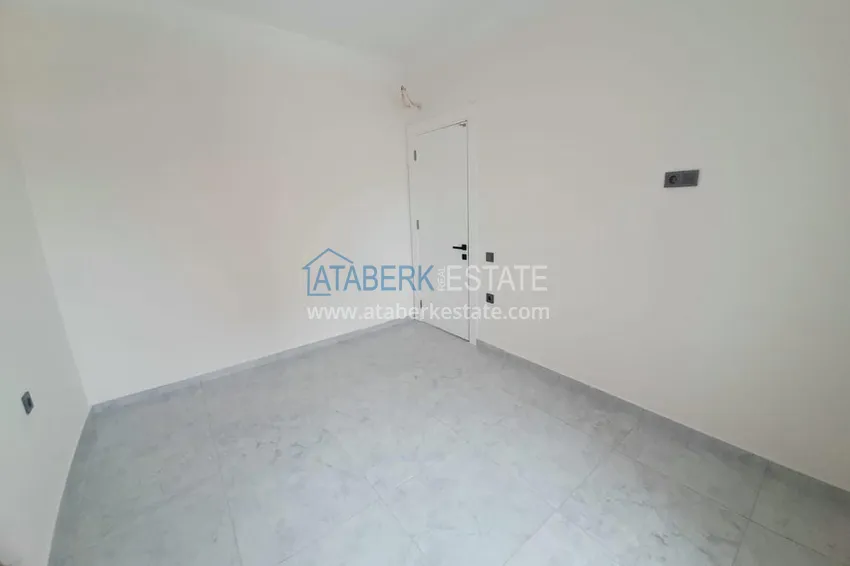 Приобрести Двухкомнатная квартира с чистовой отделкой в новом комплексе – Алания, район Авсаллар 10 