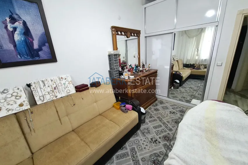 Приобрести Трехкомнатная меблированная квартира в Махмутларе - вторая береговая линия от моря 10 