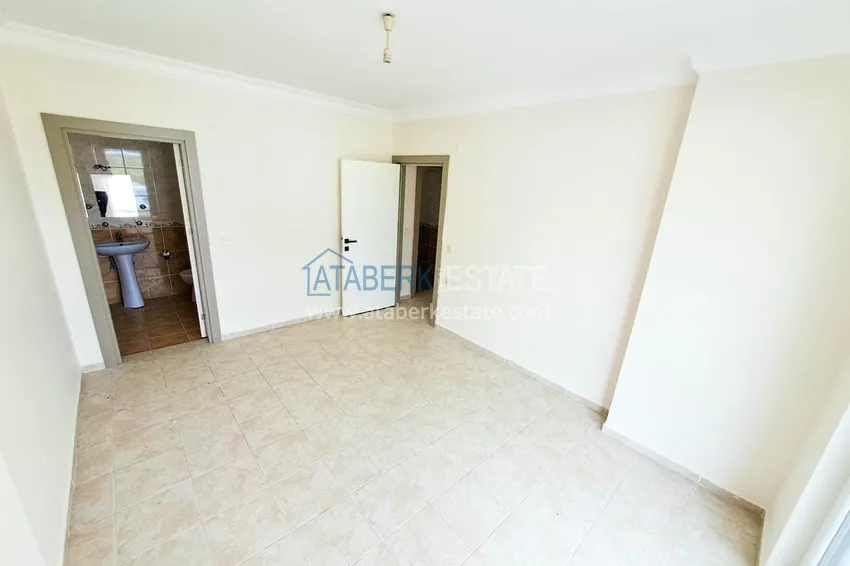 Приобрести Просторная трехкомнатная квартира с видом на море и горы в районе Махмутлар, Алания  11 