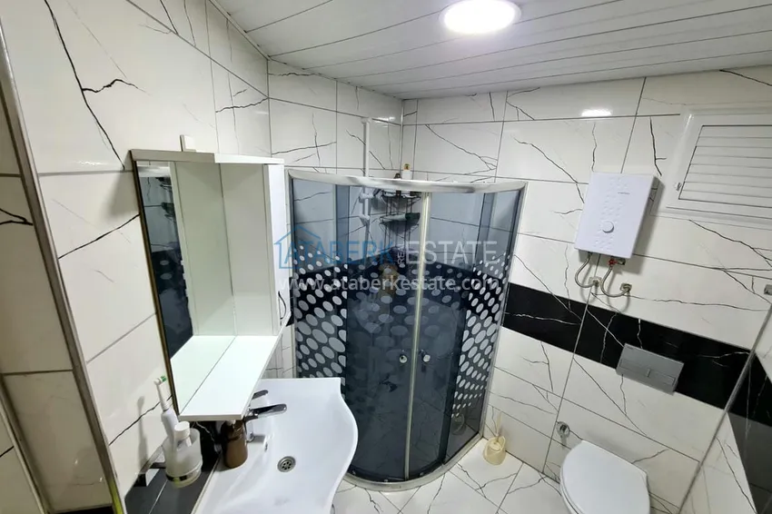 Приобрести Трехкомнатная меблированная квартира в Махмутларе - вторая береговая линия от моря 11 