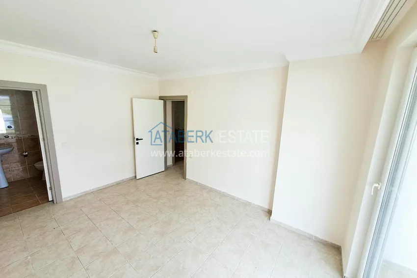 Приобрести Просторная трехкомнатная квартира с видом на море и горы в районе Махмутлар, Алания  12 