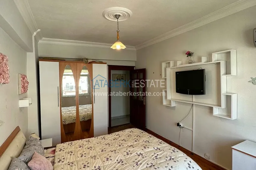 Приобрести Трехкомнатная квартира в уютном комплексе с бассейном в 300 метрах от моря 12