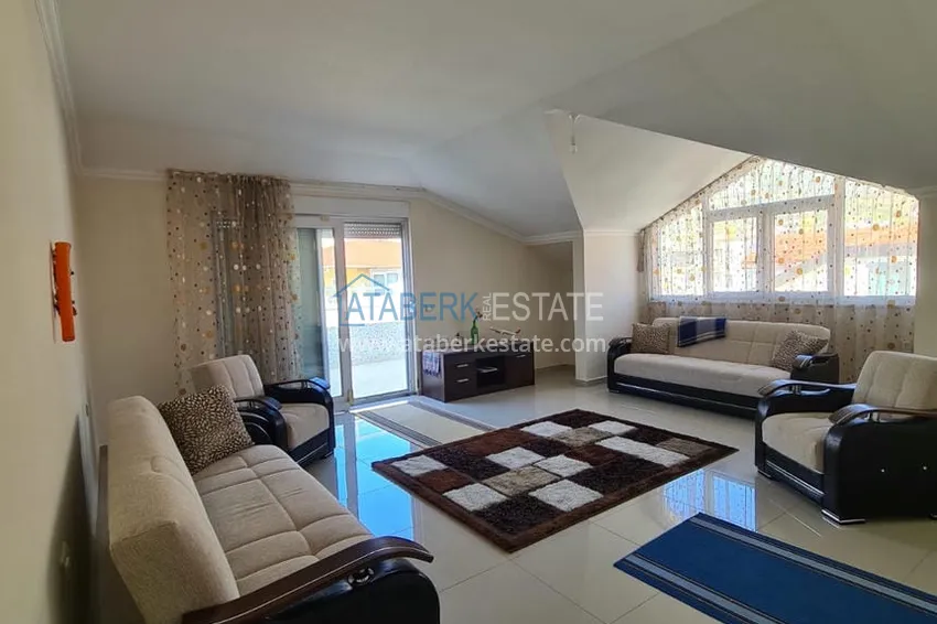 Приобрести Двухэтажная квартира с мебелью и сауной в центре Алании на первой береговой - район пляжа Клеопатра. Недвижимость под ВНЖ 12 