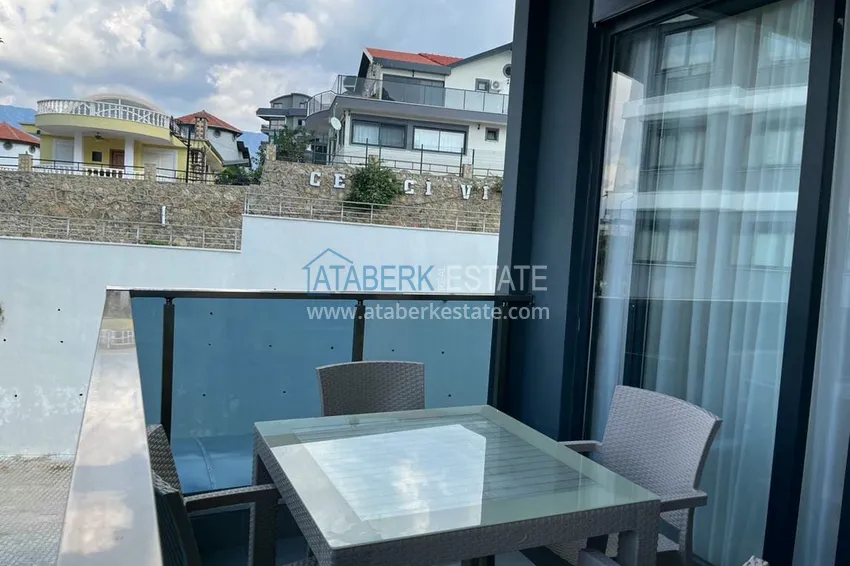 Приобрести Квартира с мебелью и видом на море в районе Каргыджак, Алания 12 