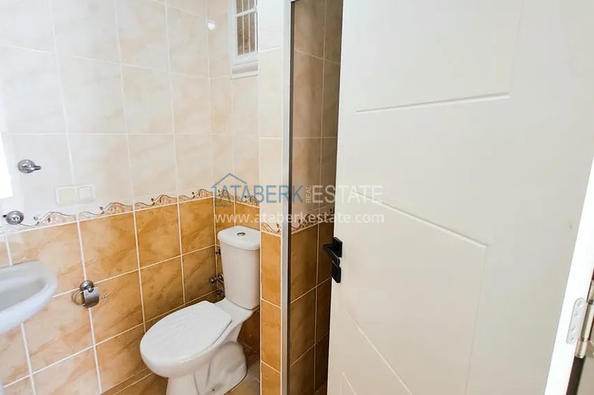 Приобрести Просторная трехкомнатная квартира с видом на море и горы в районе Махмутлар, Алания  13 