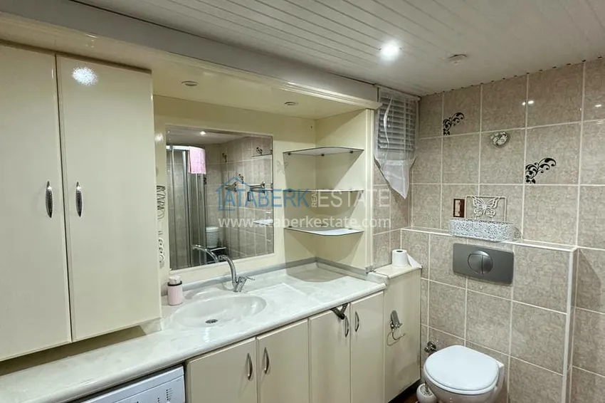 Приобрести Трехкомнатная квартира в уютном комплексе с бассейном в 300 метрах от моря 13