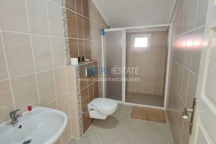 Приобрести Двухэтажная квартира с мебелью и сауной в центре Алании на первой береговой - район пляжа Клеопатра. Недвижимость под ВНЖ 13 