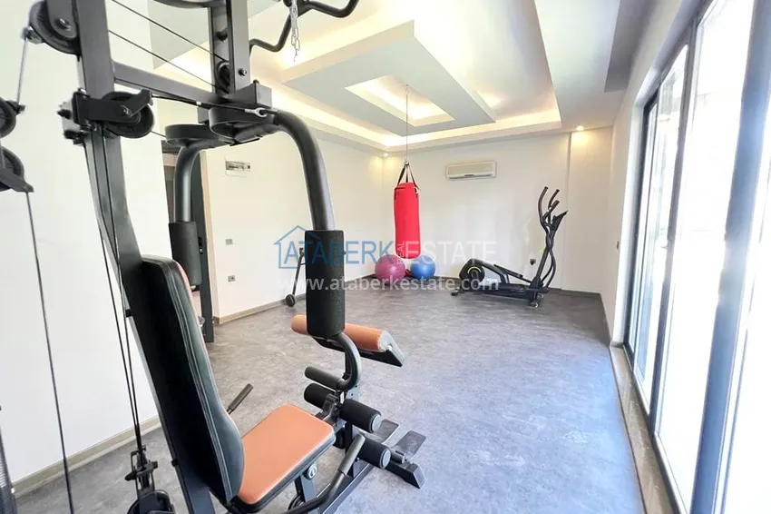 Двухкомнатная квартира с современным интерьером в Алании, район Оба 14 