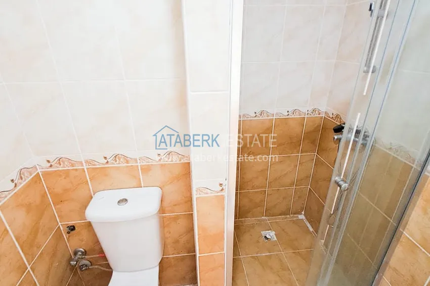 Приобрести Просторная трехкомнатная квартира с видом на море и горы в районе Махмутлар, Алания  14 