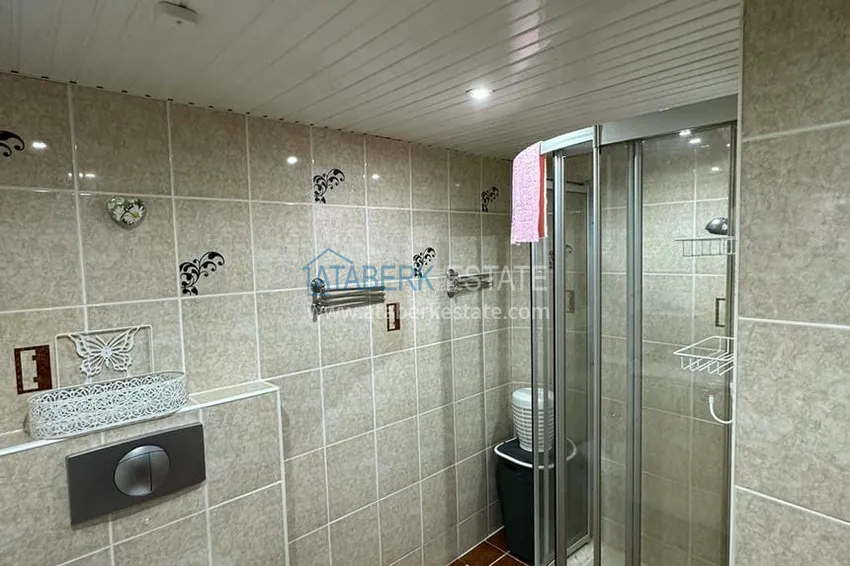 Приобрести Трехкомнатная квартира в уютном комплексе с бассейном в 300 метрах от моря 14